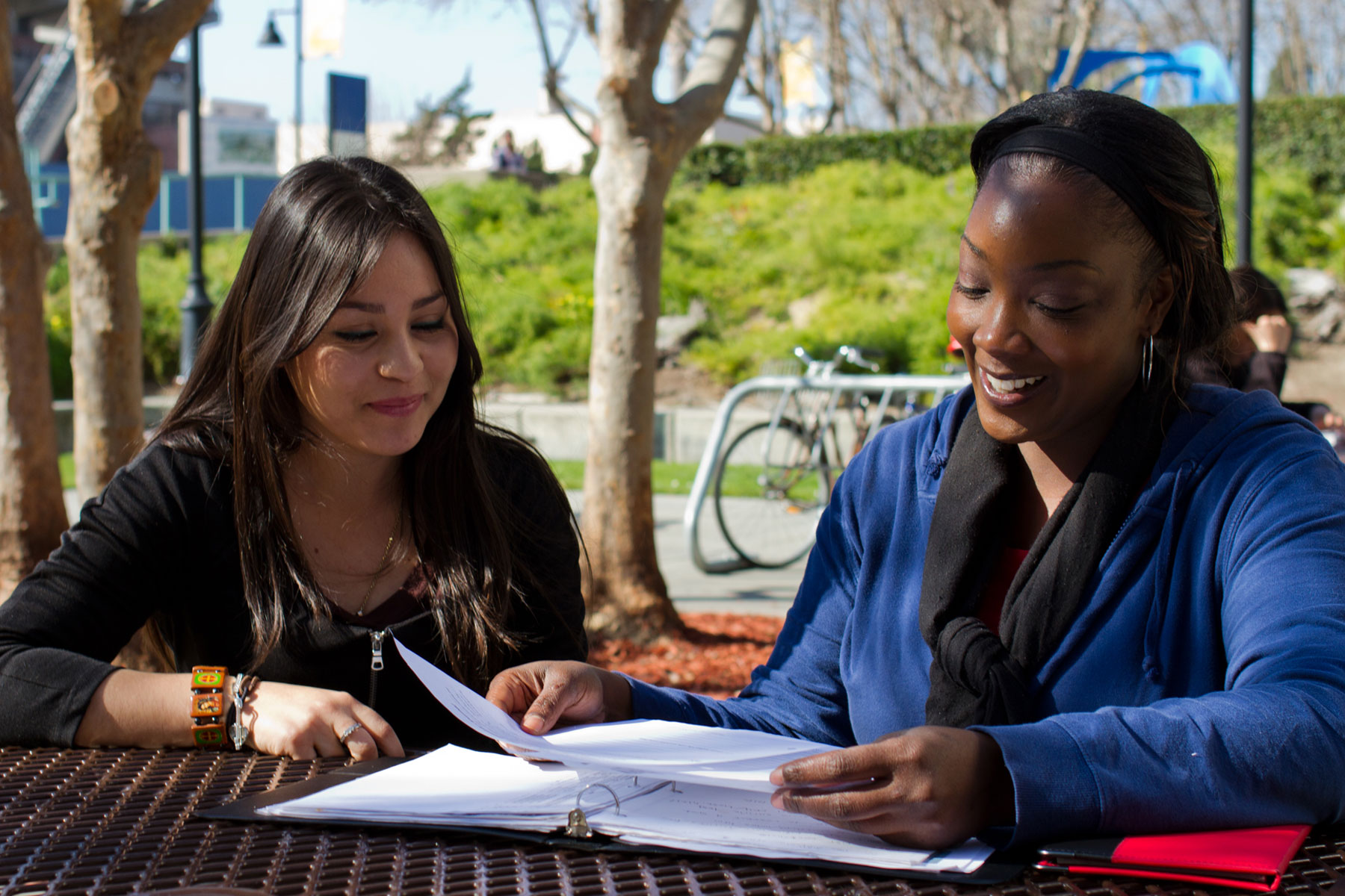 Student sitting down with Faculty