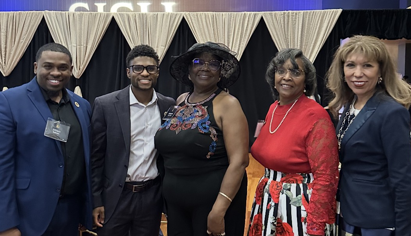 Ban members with President Teniente Matson at the Distinguished Alumni Awards