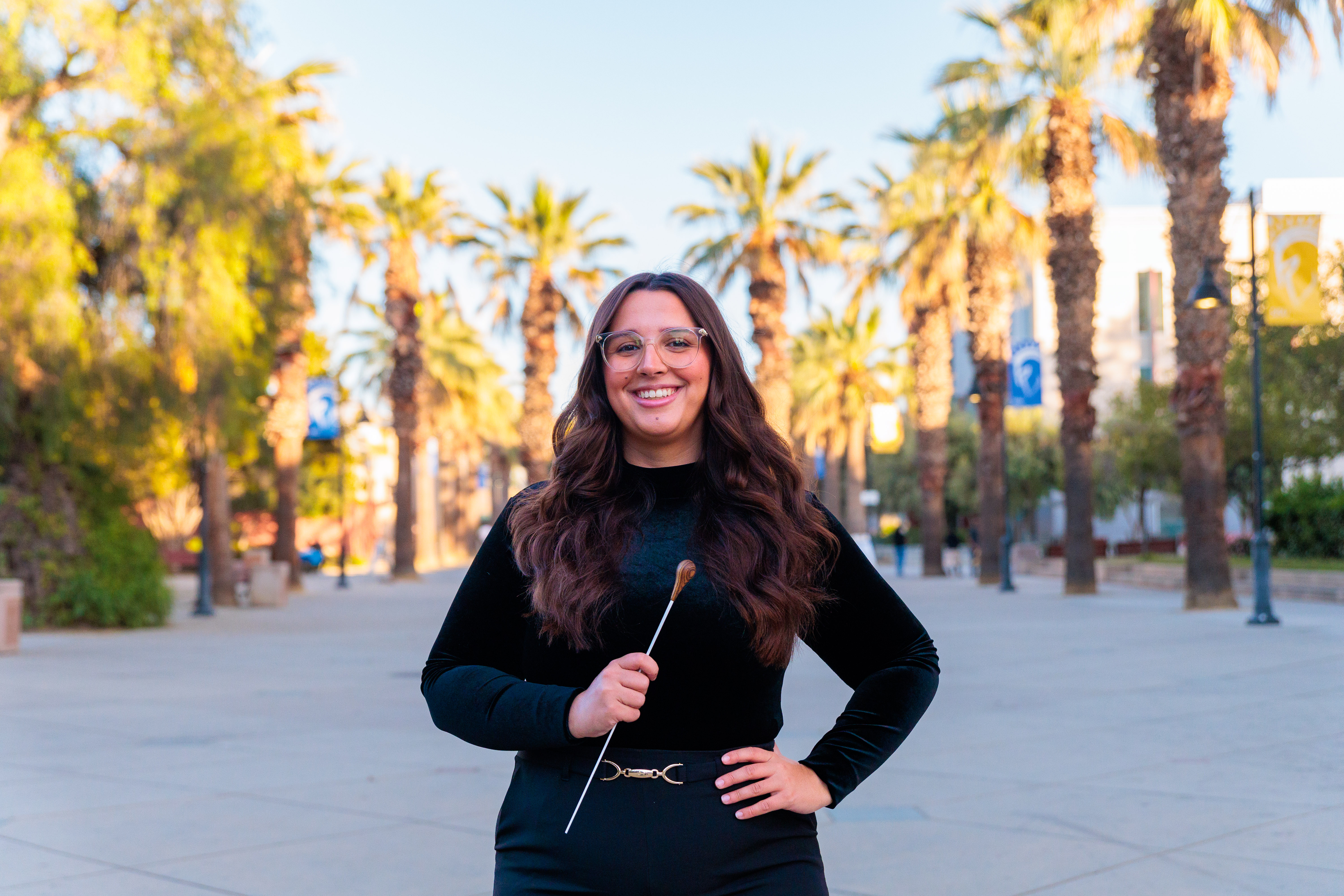 patricia standing and smiling