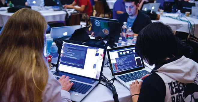 Students on computers Students on computers