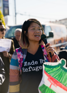 Lan Nguyen holding a megaphone