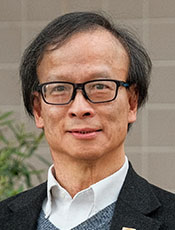 color headshot of Dr. Raymond Yee